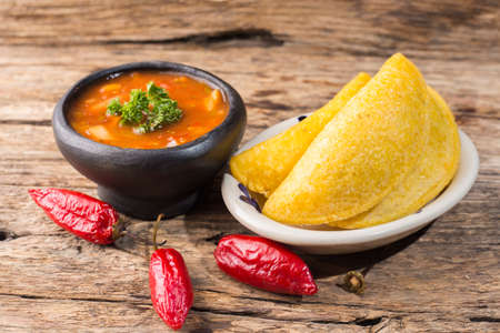 Empanadas with hot sauce, traditional Colombian foodの写真素材