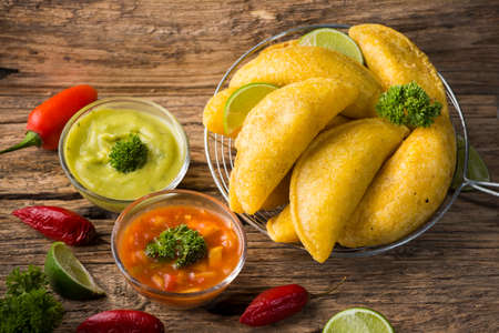Empanadas with hot sauce, traditional Colombian foodの写真素材