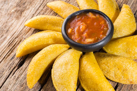 Empanadas with hot sauce, traditional Colombian foodの写真素材