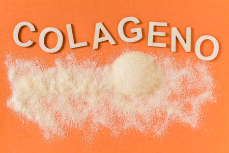 Hydrolyzed and co-compressed collagen, on orange background, top view