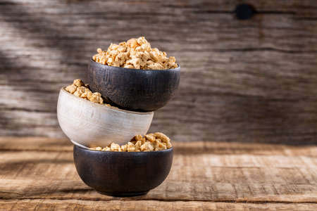 Soy protein textured on old wooden background, close-upの写真素材
