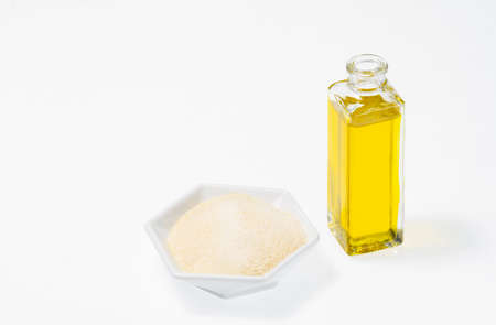 Hydrolyzed collagen in container isolated on white background, close-up imageの写真素材