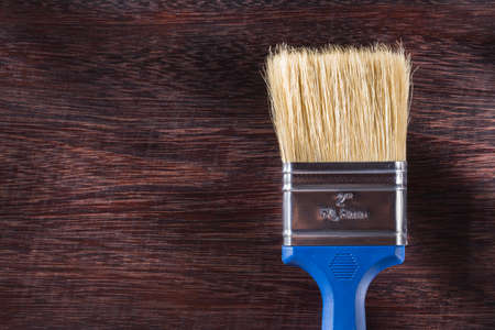 paint brush on wooden background, close-upの写真素材