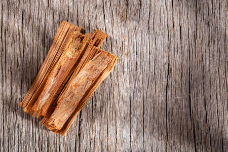 stack of palo santo wood on the table (Bursera graveolens)の写真素材