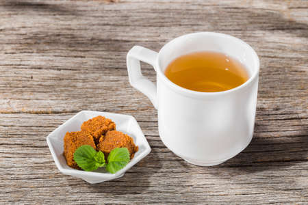 Panela tea on the table, traditional Colombian drinkの写真素材