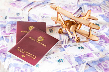 Colombian passport on Colombian money, close-up imageの写真素材