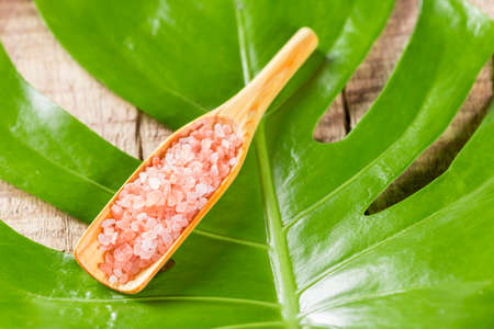 Himalayan pink salt in bowl on the table, close-up imageの写真素材