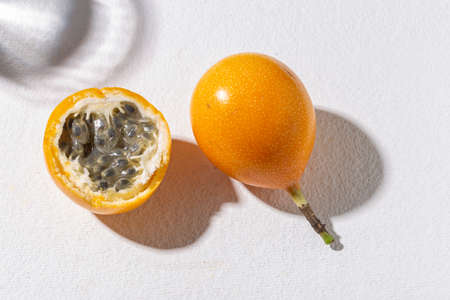 passion fruit on white background - Passiflora ligularisの写真素材