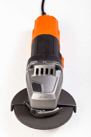 Angle grinder isolated on white background, close-up imageの写真素材