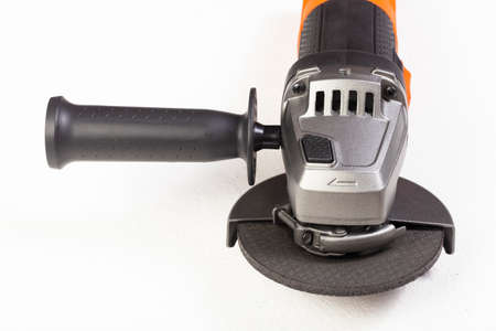 Angle grinder isolated on white background, close-up imageの写真素材