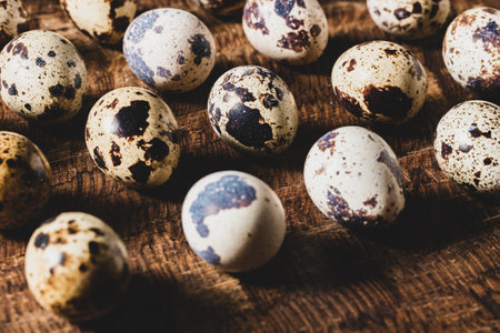 Quail eggs, on the wooden table, close-up imageの写真素材