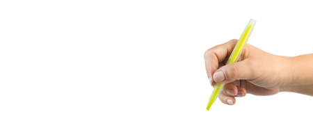 female hand holding various colored markersの写真素材