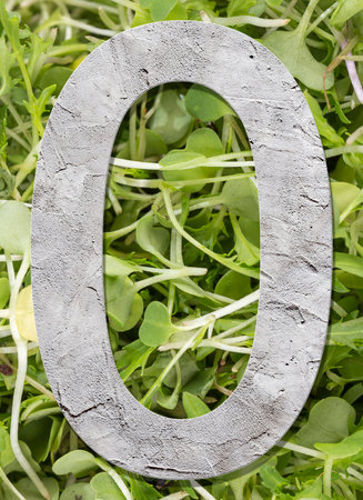 Number 0 with concrete texture, on nature backgroundの写真素材