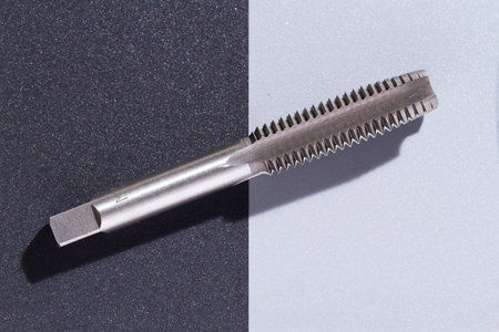 close-up image of drill bit, or tap for threads in steel, top viewの写真素材
