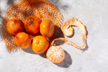pile of fresh tangerines on the concrete table, top viewの写真素材