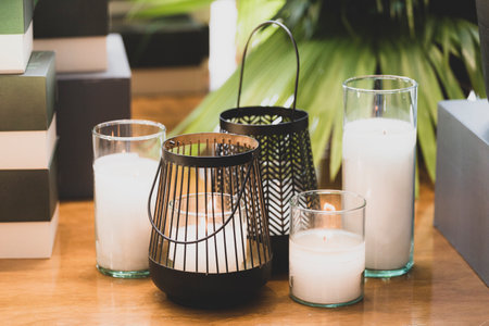 Several candles lit on the table, close-upの写真素材