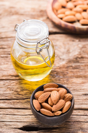 Almond oil and seeds (Prunus dulcis) close-up imageの写真素材