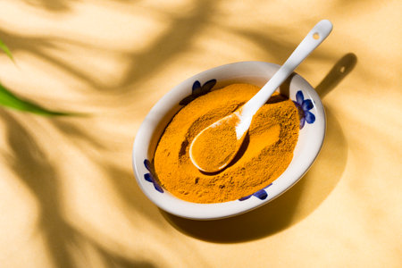Spice up your life: turmeric in a delicious curry dish with natural shadesの写真素材