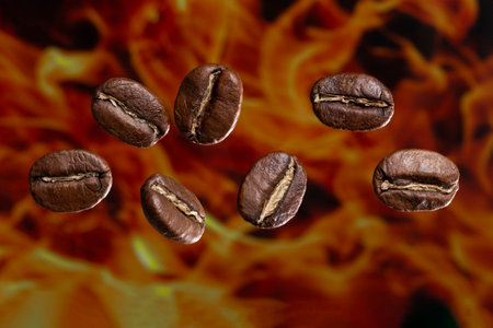 Roasted coffee beans from Colombia suspended in the air, Arabica variety.の写真素材