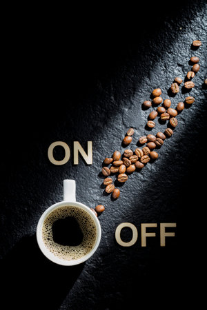 Espresso cup on black background, concept of "coffee activates you"の写真素材