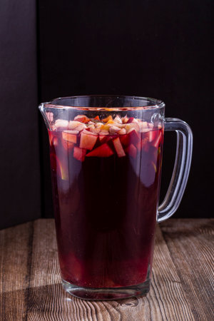 Refreshing glass of sangria over dark soundの写真素材