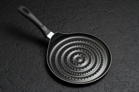 grill or frying pan for roasting arepas or tortillas, top viewの写真素材