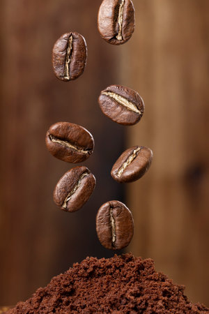 Roasted coffee beans from Colombia suspended in the air, Arabica variety.の写真素材