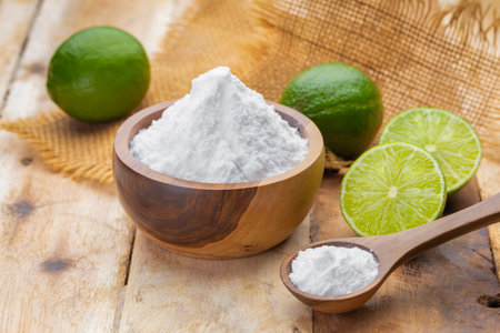 Baking soda and lime on a wooden surfaceの写真素材