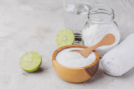 Baking soda and lime on a rustic surfaceの写真素材