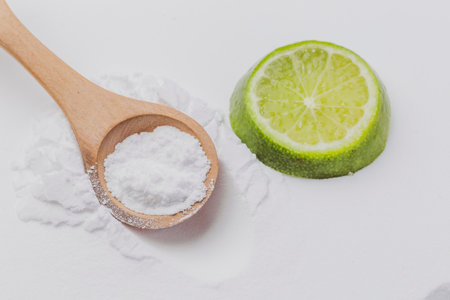 Baking soda and lemon wedge, close-up