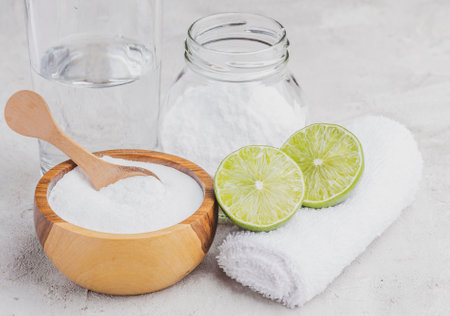 Baking soda and lime on a rustic surfaceの写真素材