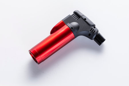 You can see a flame torch, its colors are red and black, on a white background
