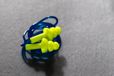 Silicone plugs for human ears on white background, close-up imageの写真素材