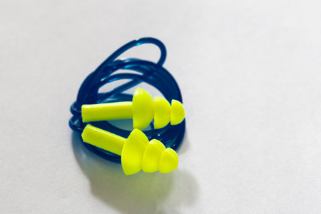 Silicone plugs for human ears on white background, close-up imageの写真素材