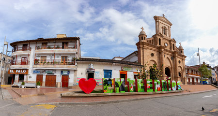 View of the Church of Our Lady of Sorrows, in the main park of EntrerrÃ­os, Antioquia, Colombiaの写真素材