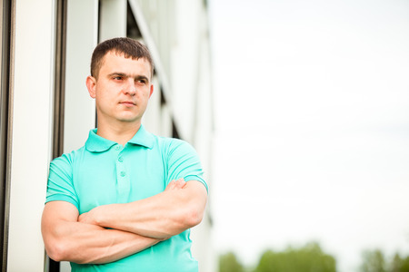Portrait serious young men in the Parkの写真素材