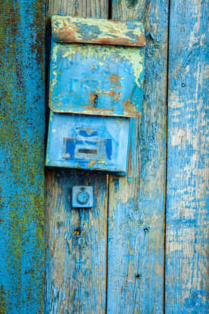 old mailbox on wooden wallの写真素材