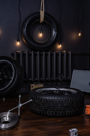background in the style of tire shop with car wheelsの写真素材