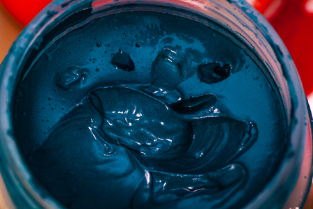 blue gouache in a jar macro close-upの写真素材