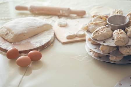Uzbek national food manta, like dumplings, background of ingredients and semi-finished productsの写真素材