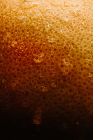 Grapefruit close-up with drops, splashing water, fresh fruit. High quality photo