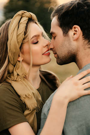 Cute romantic couple hugging tenderly in nature. High quality photoの写真素材