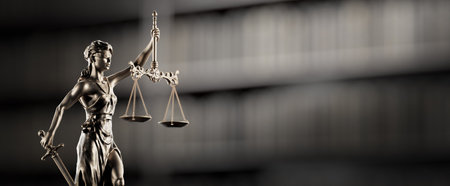 Legal Concept: Themis is Goddess of Justice and law on the background of booksの写真素材