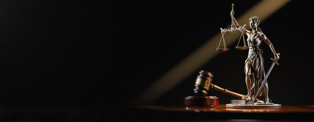 Legal Concept: Themis is the goddess of justice and the judges gavel hammer as a symbol of law and orderの写真素材