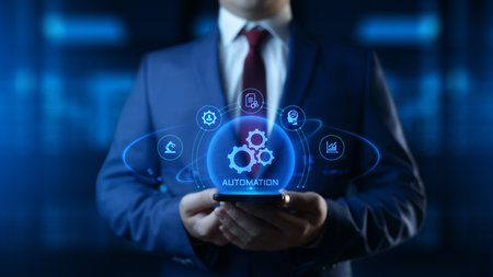 Businessman Holding smartphone with Automation Process Icons on Screen. Business and Industry conceptの写真素材