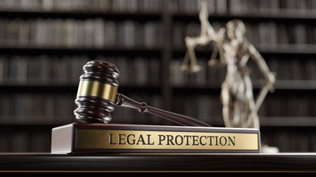 Legal Protection: Judges Gavel, Themis is the goddess and wooden stand with text wordの写真素材