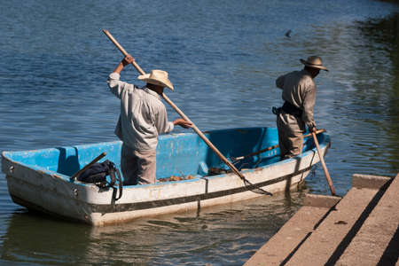 Lagoon of Illusions men in boat, Tomas Garrido Canabal Park Villahermosa, Tabasco, Mexicoの写真素材