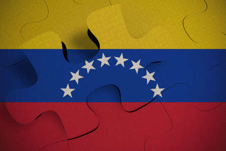 Composition of the concept of crisis and integration of a country Venezuela FLAG PAINTED ON PUZZLE 3D RENDERの写真素材