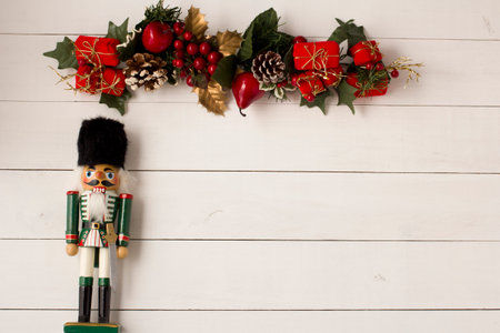 Interesting beautiful Christmas ornaments decorations with nutcracker soldier on white colored...