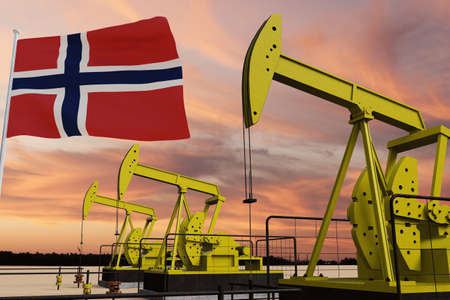 Nice pumpjack oil extraction and cloudy sky in sunset with the Norway flag.の写真素材